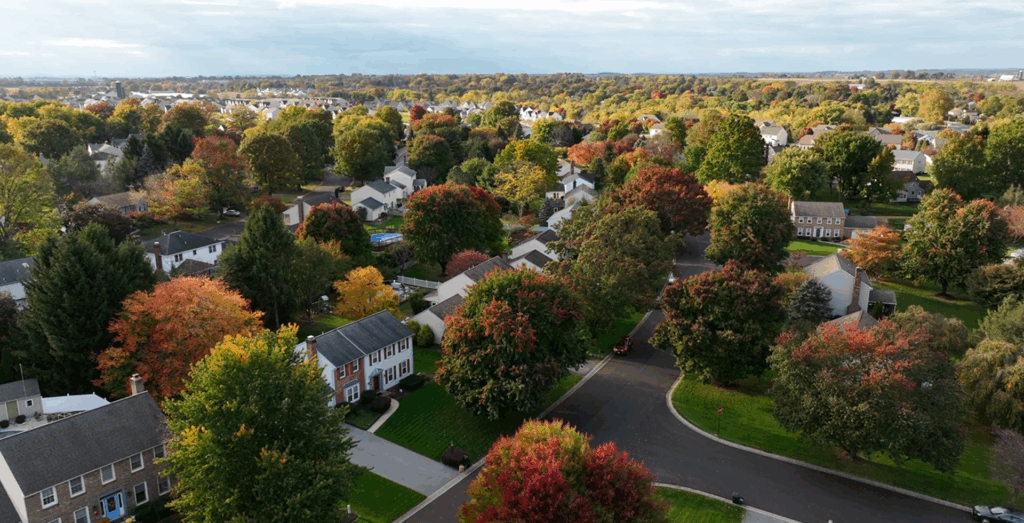Suburban neighborhood with autumn foliage.